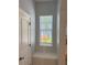 Window seat in hallway with window and door at 625 Mirabay Blvd, Apollo Beach, FL 33572