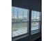 A picturesque window view of the canal and waterfront homes in the neighborhood at 625 Mirabay Blvd, Apollo Beach, FL 33572