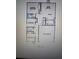 Floor plan showing bedrooms, bathrooms, kitchen, living room, dining room, and garage at 6422 Towhlen Rd, North Port, FL 34291