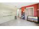 A bedroom with two paint colors and an open doorway at 7210 N Manhattan Ave # 1721, Tampa, FL 33614