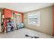 This bedroom has a window with neutral walls and tile flooring at 7210 N Manhattan Ave # 1721, Tampa, FL 33614