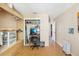 A bedroom with a closet, small shelf, desk, and a window for natural light at 7210 N Manhattan Ave # 1721, Tampa, FL 33614