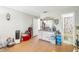Bedroom with parquet flooring and a doorway view to the bathroom at 7210 N Manhattan Ave # 1721, Tampa, FL 33614
