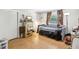 Cozy bedroom featuring parquet floors and a daybed near a bright window at 7210 N Manhattan Ave # 1721, Tampa, FL 33614