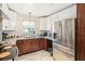 A kitchen featuring stainless steel appliances, white subway tile backsplash, and tiled floors at 7210 N Manhattan Ave # 1721, Tampa, FL 33614