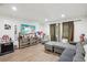 The living room is filled with natural light and unique decor at 7210 N Manhattan Ave # 1721, Tampa, FL 33614