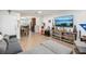 The living room has wood-look floors and space for comfortable seating at 7210 N Manhattan Ave # 1721, Tampa, FL 33614