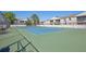 Enjoy community tennis courts surrounded by mature landscaping and privacy fencing at 7210 N Manhattan Ave # 1721, Tampa, FL 33614