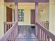 Close up of the exterior entrance showing the front door and unit number seven at 7741 Forest Trl # 7, Port Richey, FL 34668