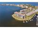 Panoramic aerial showcasing waterfront condo community with boat docks and serene surroundings at 8150 Brent St # 725, Port Richey, FL 34668