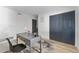 Bright office with desk, closet and modern decor for a productive work-from-home setup at 8150 Brent St # 725, Port Richey, FL 34668