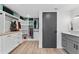 Custom walk-in closet with built-in shelving, drawers, and a marble topped island at 8150 Brent St # 725, Port Richey, FL 34668