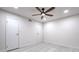 Bedroom with wood-look floors, ceiling fan, and neutral walls creating a serene space at 9100 Dr Martin Luther King Jr N St # 1706, St Petersburg, FL 33702