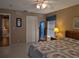 View of bedroom and open door to ensuite bath at 9208 37Th N St, Pinellas Park, FL 33782