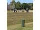 Golf course with lush green fairways, and golf carts, offering recreational opportunities at 9208 37Th N St, Pinellas Park, FL 33782