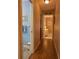 Hallway showing the entrance to both the main bedroom and the bathroom of the house at 9208 37Th N St, Pinellas Park, FL 33782
