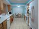 Efficient kitchen with a breakfast nook and modern appliances offers convenience and style at 9208 37Th N St, Pinellas Park, FL 33782