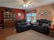 Comfortable living room featuring plush sofas and large picture window at 9208 37Th N St, Pinellas Park, FL 33782