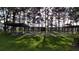 The community shuffleboard courts are surrounded by shade trees and a pavilion, perfect for outdoor recreation at 9208 37Th N St, Pinellas Park, FL 33782
