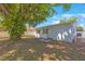 Spacious backyard featuring a large tree at 6711 3Rd N St, St Petersburg, FL 33702