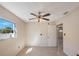 Cozy bedroom featuring a ceiling fan and a window at 6711 3Rd N St, St Petersburg, FL 33702