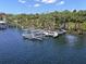 A private boat dock offers direct access to the tranquil waters, complete with boat lifts at 10905 Elliot St, Riverview, FL 33578