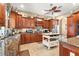 Spacious kitchen offers abundant cabinet space, stainless steel appliances, and center island, great for entertaining at 10905 Elliot St, Riverview, FL 33578