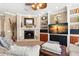 Comfortable living room with fireplace, built-ins, and soft natural lighting at 10905 Elliot St, Riverview, FL 33578