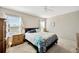 Bedroom featuring carpet floors, natural light, and pond views at 11221 Gold Compass St, Gibsonton, FL 33534