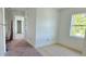 Open bedroom layout with light hardwood floors and ample natural light at 1405 50Th N Ave, St Petersburg, FL 33703