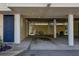Ground level carport with adjacent entry at 1500 Sunset Rd # G4, Tarpon Springs, FL 34689