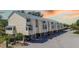 Coastal townhome with beachy vibe and front carports, near area attractions at 1500 Sunset Rd # G4, Tarpon Springs, FL 34689