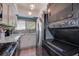 Well-equipped kitchen with stainless steel appliances and stylish cabinetry at 1500 Sunset Rd # G4, Tarpon Springs, FL 34689