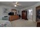 Large main bedroom provides access to ensuite bathroom and closet at 1500 Sunset Rd # G4, Tarpon Springs, FL 34689