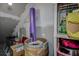 A cluttered storage area with a variety of household items and cleaning supplies at 1500 Sunset Rd # G4, Tarpon Springs, FL 34689