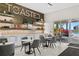 Relaxing cafe with modern decor, seating area, and access to the pool at 15635 Sacile Ln, Bradenton, FL 34211