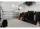 Spacious two car garage with epoxy floor, and plenty of storage at 15635 Sacile Ln, Bradenton, FL 34211