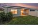 Private backyard with well-maintained lawn, patio and partial fence, perfect for outdoor activities at 18184 Turning Leaf Cir, Land O Lakes, FL 34638