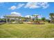 Shaded picnic area and playground offer residents a place for outdoor recreation and community gatherings at 18184 Turning Leaf Cir, Land O Lakes, FL 34638