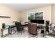 Bright office space featuring tiled floors, neutral paint, and space for two desks near a large window at 1830 Bough Ave # 2, Clearwater, FL 33760