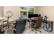 Bright office space featuring tiled floors, neutral paint, and space for two desks near a large window at 1830 Bough Ave # 2, Clearwater, FL 33760