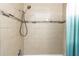 Updated shower featuring modern tile design and sleek fixtures at 1830 Bough Ave # 2, Clearwater, FL 33760