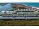 Stunning aerial view showcasing the property, its proximity to the beach and waterfront at 19823 Gulf Blvd # 33, Indian Shores, FL 33785