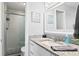 Stylishly renovated bathroom with a large mirror and a spacious shower area at 19823 Gulf Blvd # 33, Indian Shores, FL 33785