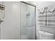 Modern bathroom featuring glass-enclosed shower with tiled walls and updated fixtures at 19823 Gulf Blvd # 33, Indian Shores, FL 33785