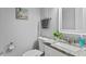 Clean bathroom features a granite vanity, framed mirror, and modern fixtures at 19823 Gulf Blvd # 33, Indian Shores, FL 33785