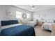 Bedroom featuring multiple beds and neutral decor for a relaxing atmosphere at 19823 Gulf Blvd # 33, Indian Shores, FL 33785