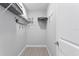 Walk-in closet featuring metal shelving and space for storage at 19823 Gulf Blvd # 33, Indian Shores, FL 33785