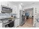 Bright, updated kitchen with stainless steel appliances and granite countertops at 19823 Gulf Blvd # 33, Indian Shores, FL 33785