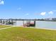 A small red dock on the water at 203 Bath Club N Blvd, North Redington Beach, FL 33708